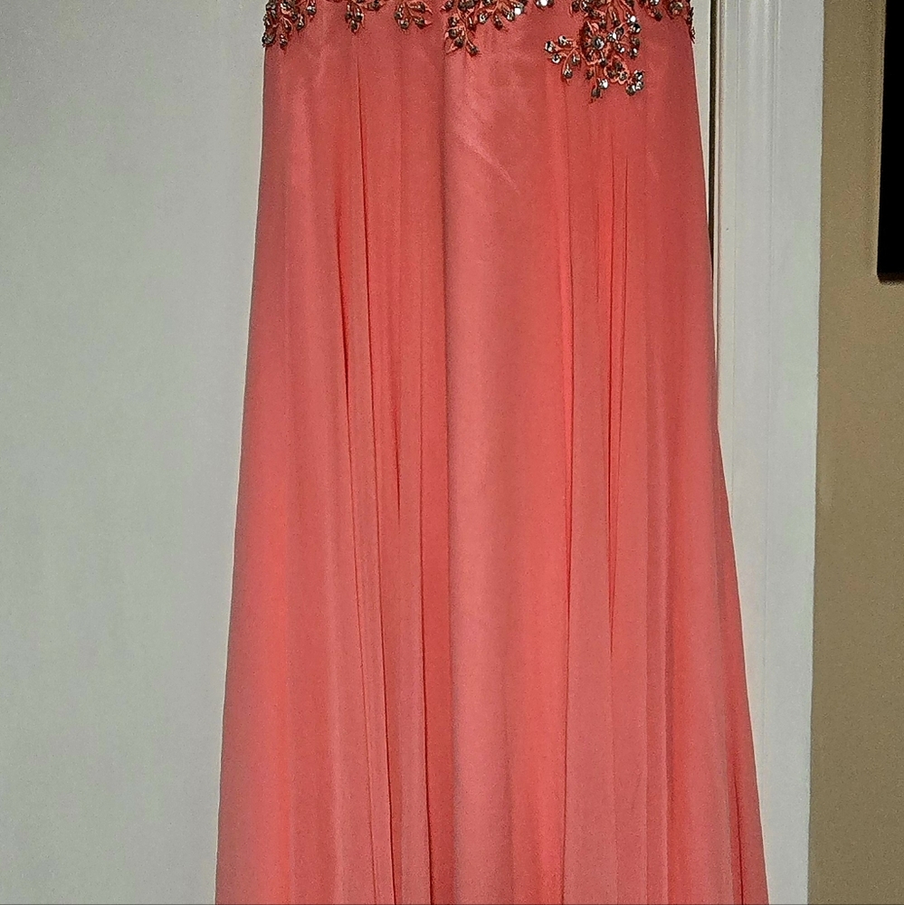 Gown by Anna Rose size 12 peach in color